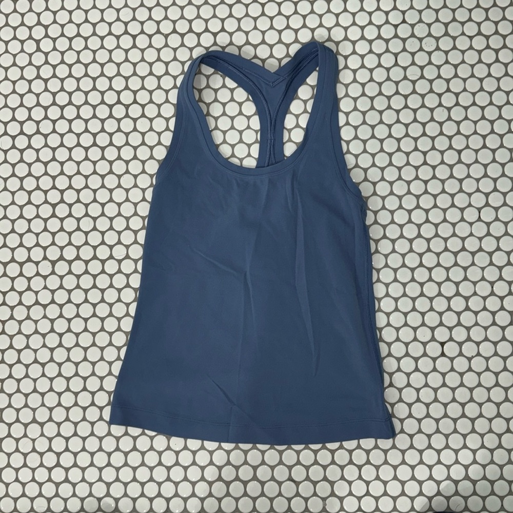 Lululemon racer back tank top. I think size 4 but size is missing. EUC